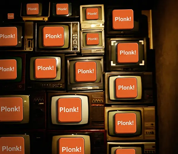 Plonkus trivia boards displayed on multiple TV screens
